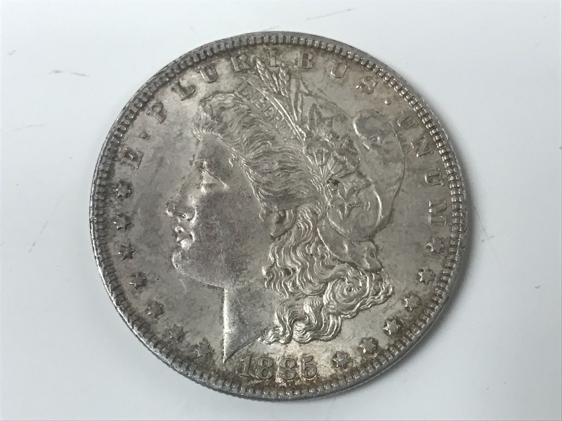 lot 22 image: 1885 Morgan Silver Dollar ...