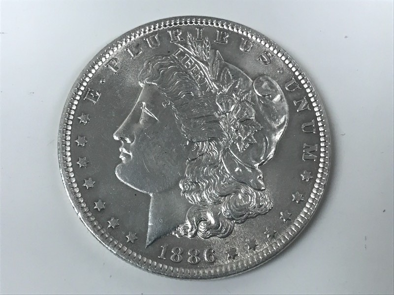 lot 25 image: 1886 Morgan Silver Dollar ...