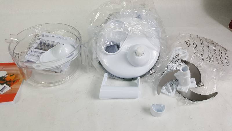 lot 73 image: Miracle Kitchen Plus - 7 in 1 - Chop  Slice  Shred  Juice 