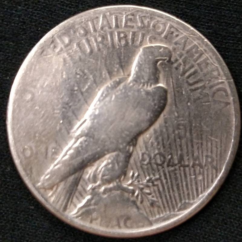 1928 Peace Silver Dollar (Mint Mark...