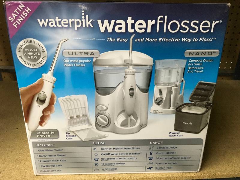 lot 374 image: WATERPIK ULTRATRAVELER, MSRP $79.99