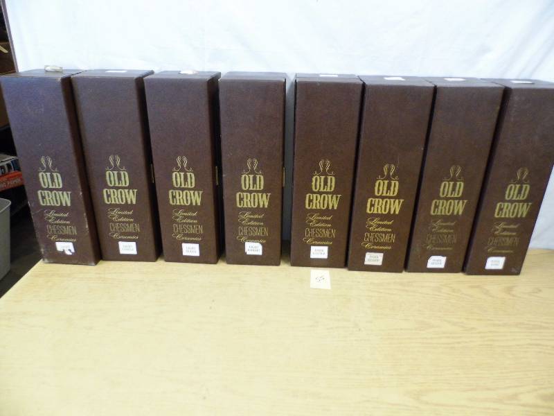 lot 55 image: Old Crow Decanter Chess Pieces