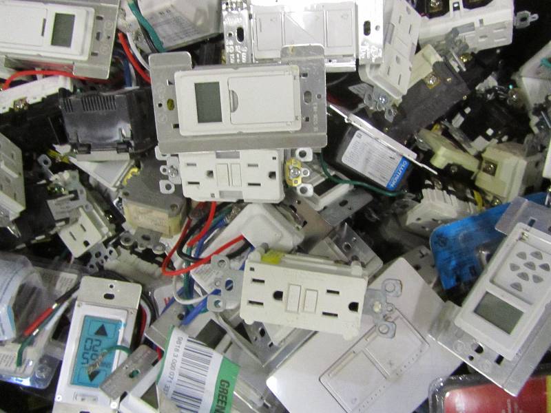 lot 73 image: 1 tote of digital timers gfi outlets.