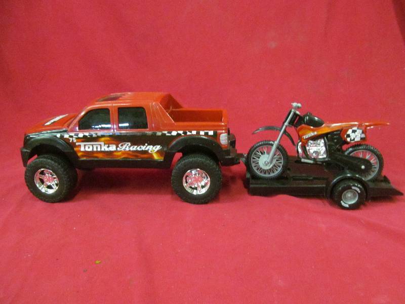 lot 65 image: Tonka Racing truck, trailer, motorcycle