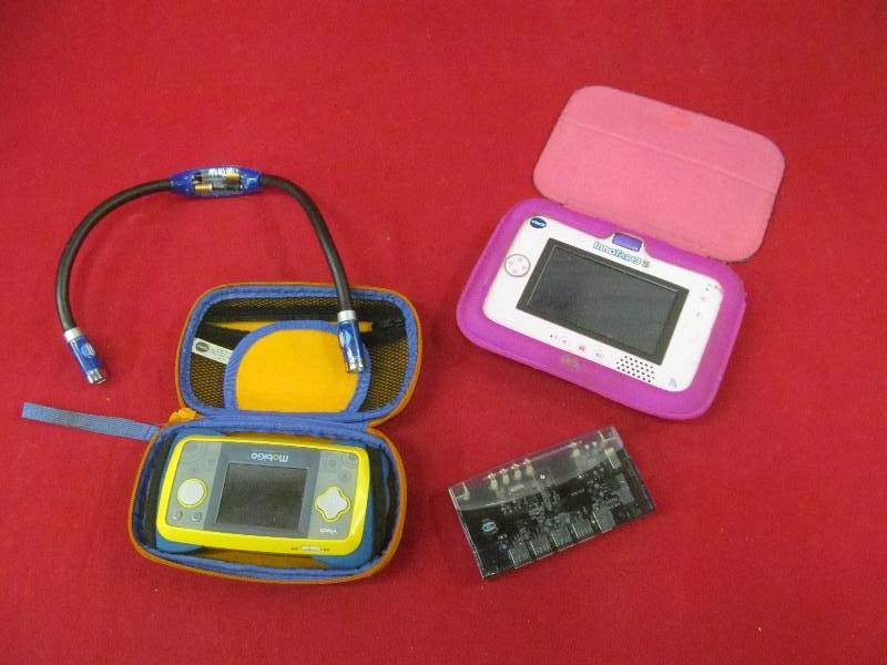 lot 187 image: Hug light, Mobigo learning system, Inno tab 35 Vtech,Belkin hub
