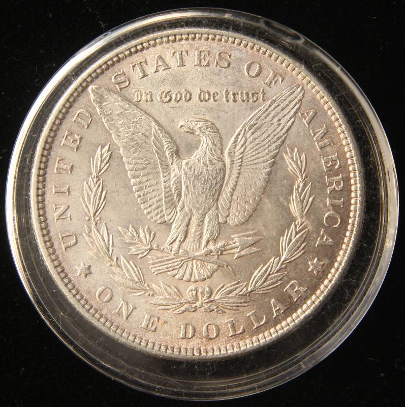 1885 MORGAN SILVER DOLLAR AU58 IN AIRTITE HOLDER