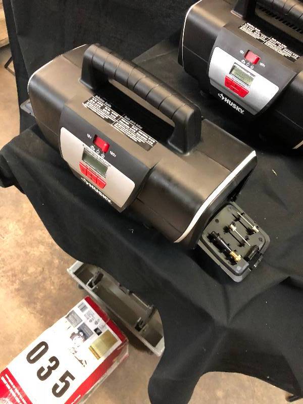 lot 35 image: Husky 12-Volt120-Volt Home and Auto Inflator