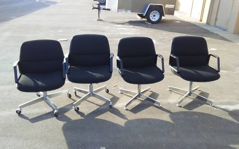 4-Black Executive Office Chairs (2-Black & 2-Stationary)