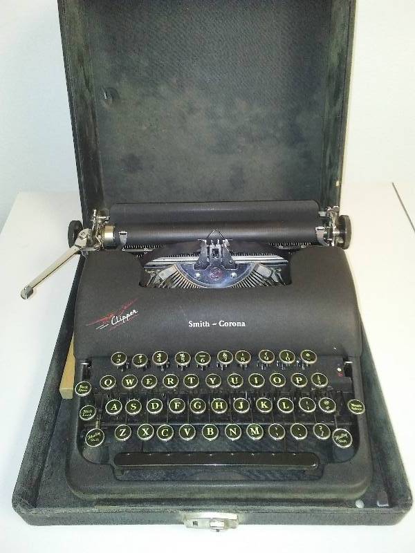 Vintage Smith-Corona Typewriter with case.
