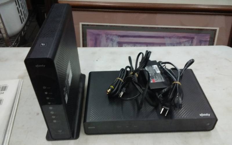 lot 35 image: Infinity Cable Box & Cable Modem