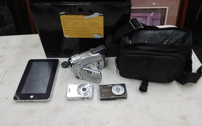 lot 39 image: Sony Cybershot, Olympus 4020 Digital Cameras, Canon ZR-90 Camcorder, Tablet (No Chargers)