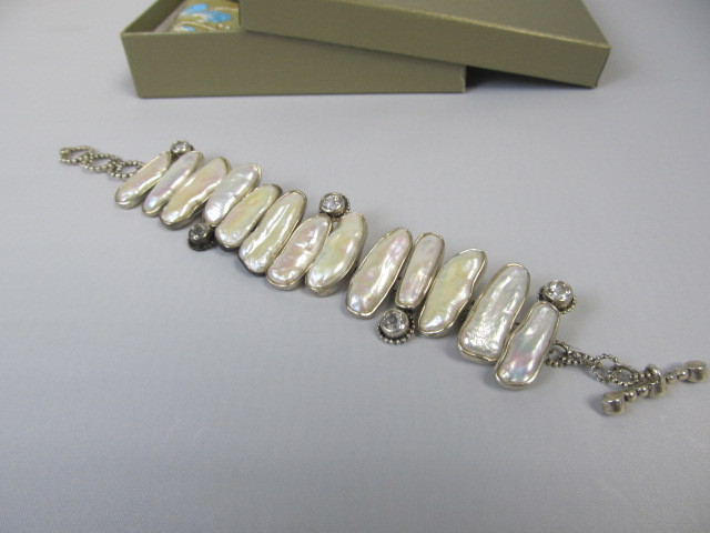 lot 211 image: Heavy Sterling Silver & Mother of Pearl Bracelet