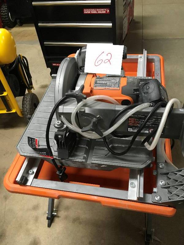 lot 62 image: Ridgid 7 in. Tile Saw with Stand used in working condition