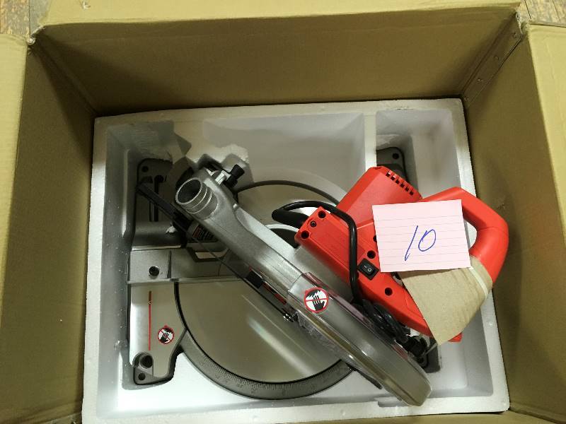 lot 10 image: HomeCraft 14 Amp 10 in. Compound Miter Saw with Laser in like new condition