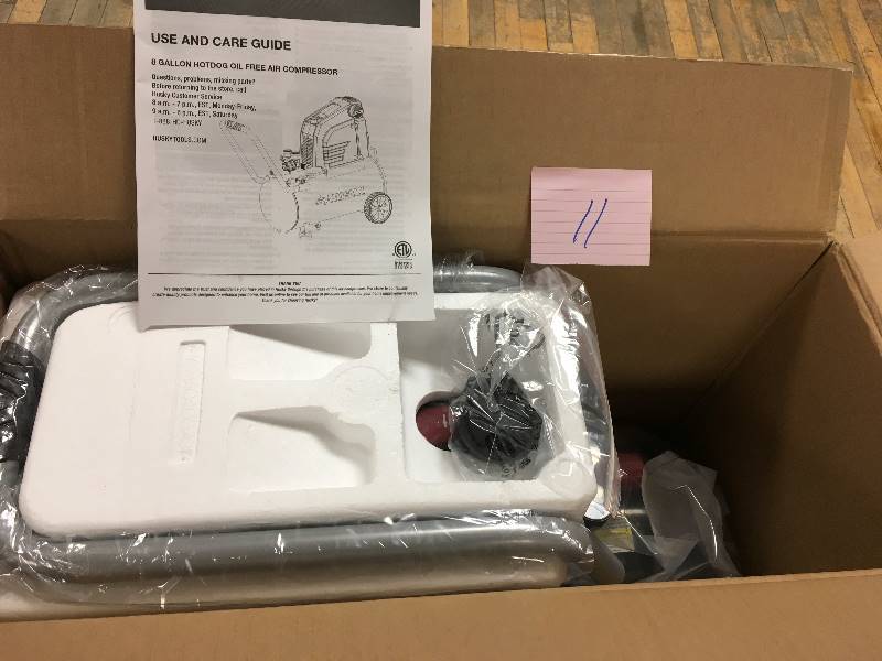 lot 11 image: Husky 8 Gallon Portable Oil Free Electric Air Compressor open box not used