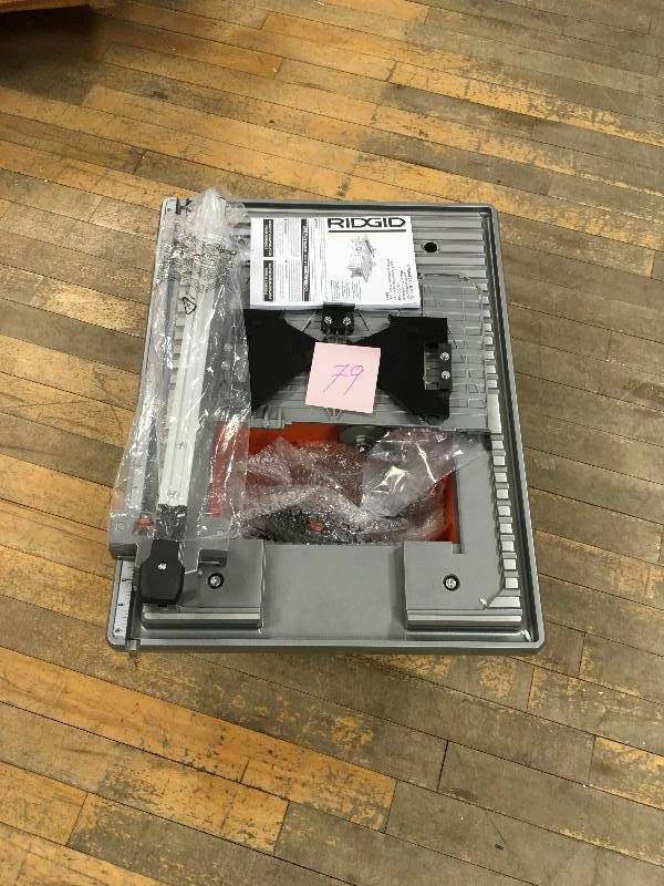lot 79 image: Ridgid 120-Volt 7 in. Table Top Wet Tile Saw not used