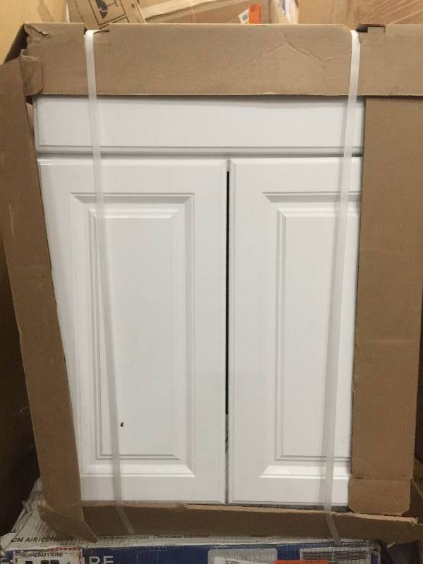 Hampton Bay Hampton Assembled 24 x 34.5 x 21 in. Base Bath Vanity Cabinet in Satin White open box never used