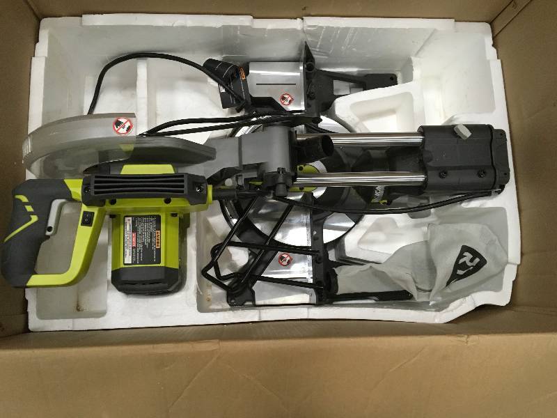 Ryobi 15-Amp 10 in. Sliding Miter Saw with Laser Model#  TSS102L in like New working conditions