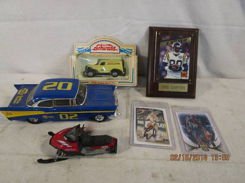 lot 135 image: Collector Chris Carter Collector Card Little car, csnowmobile, scwands truck, basketball cards,
