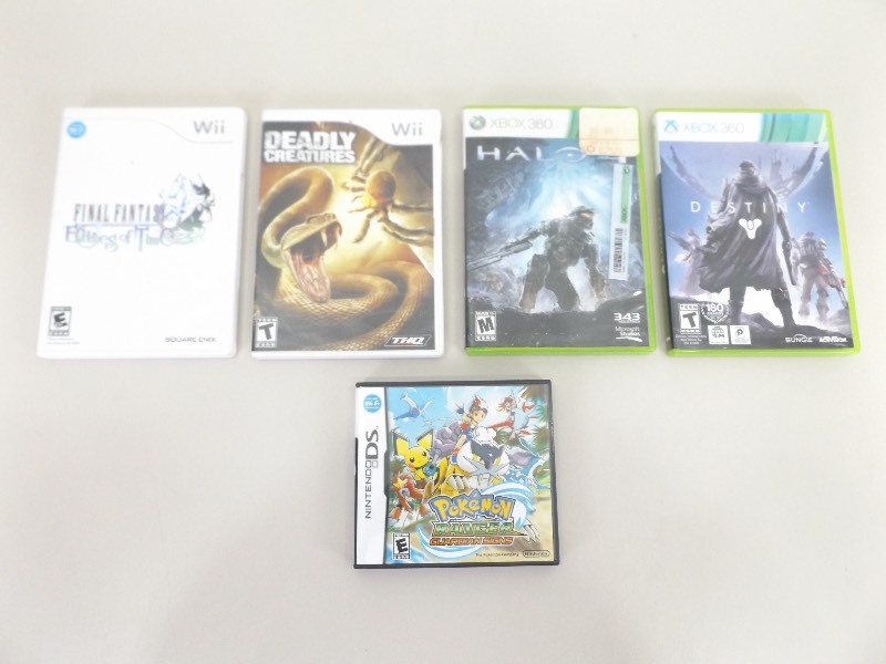 lot 29 image: Lot of Collectible Nintendo Wii, DS, and XBox 360 Games