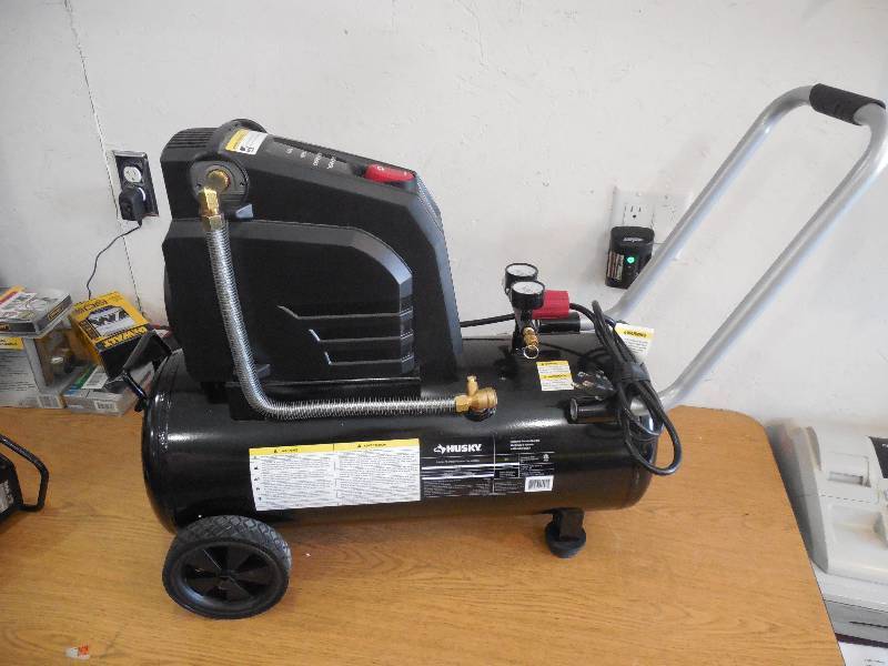 lot 32 image: Husky 8 Gal. Portable Oil Free Electric Air Compressor