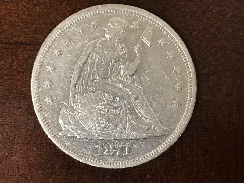 lot 13 image: 1871 Seated Liberty Silver Dollar...