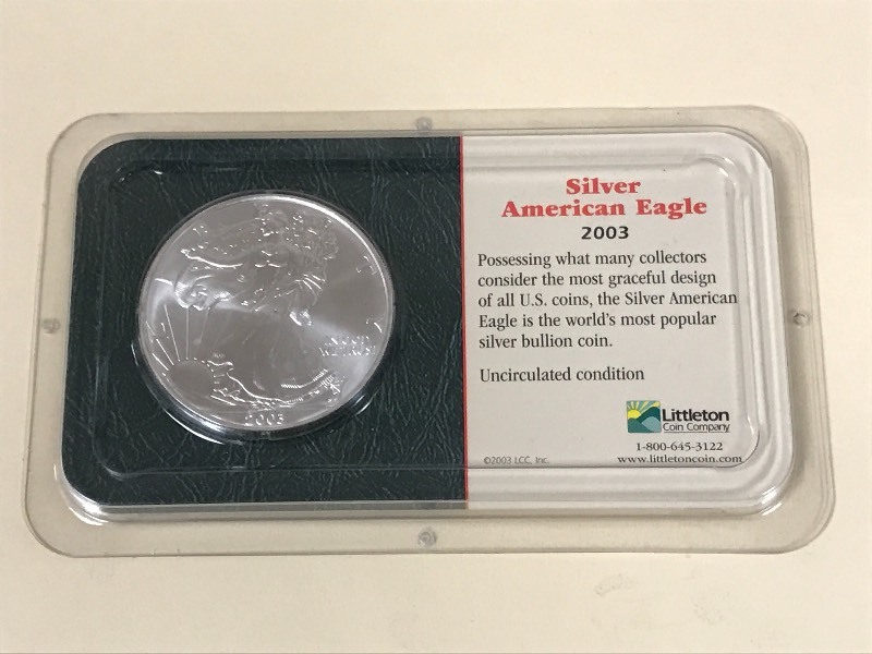 lot 23 image: 2003 American Eagle Silver Dollar C...