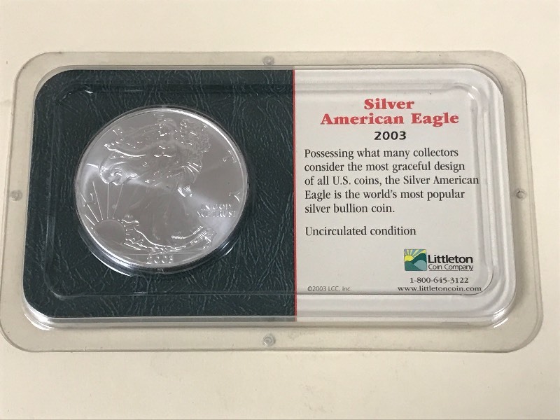 lot 25 image: 2003 American Eagle Silver Dollar C...