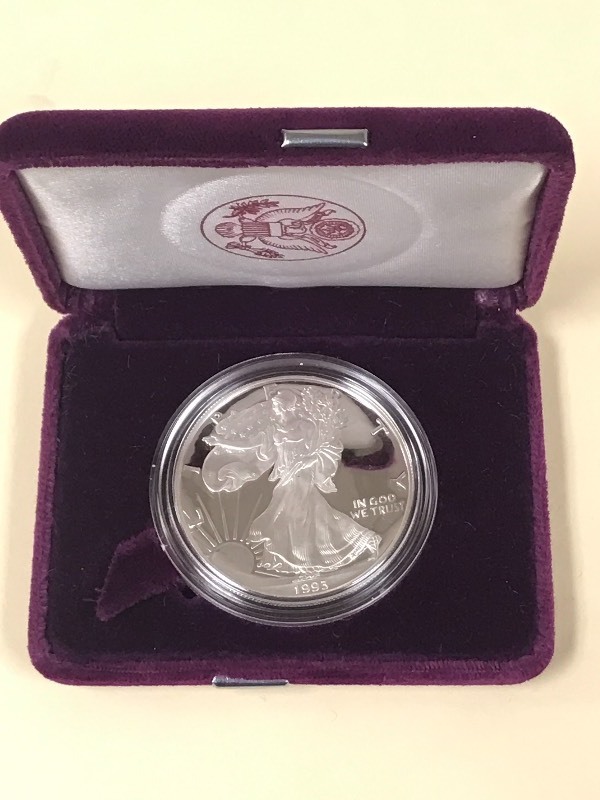 lot 34 image: 1993-P Silver American Eagle Dollar...