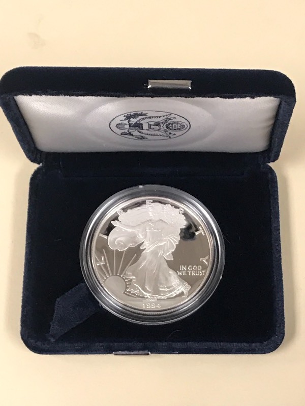 lot 35 image: 1994-P Silver American Eagle Dollar...
