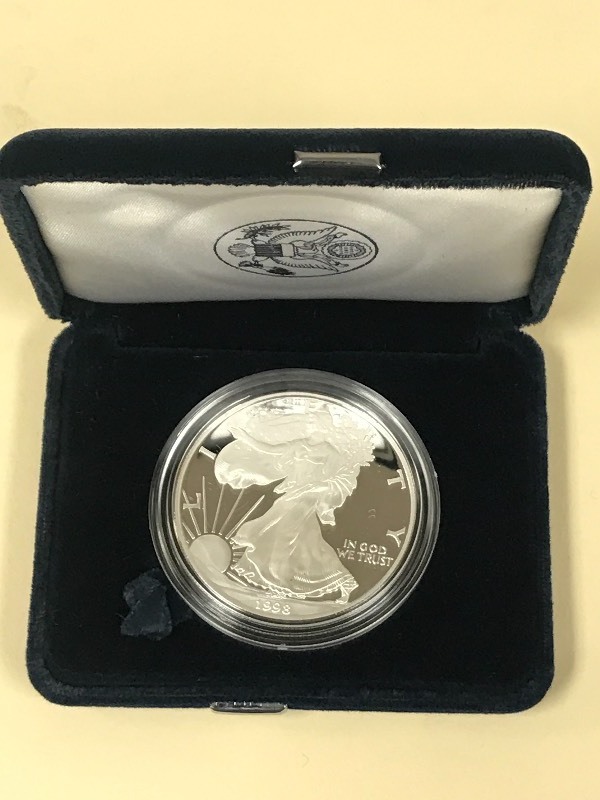 lot 39 image: 1998-P Silver American Eagle Dollar...
