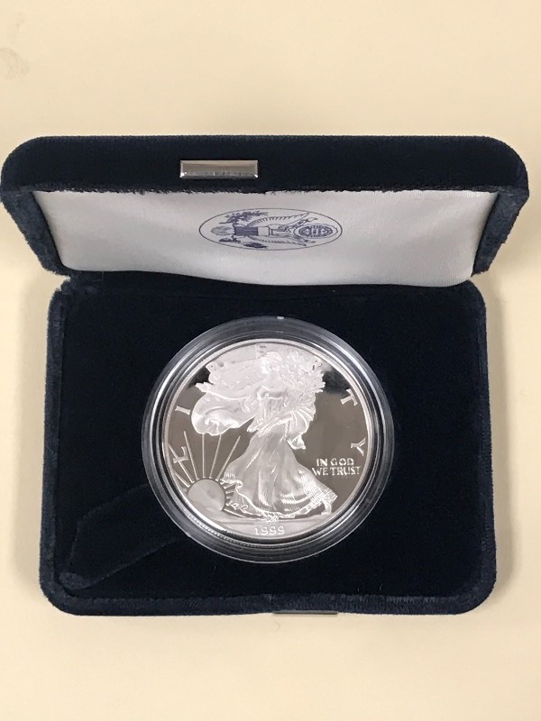 lot 40 image: 1999-P Silver American Eagle Dollar...