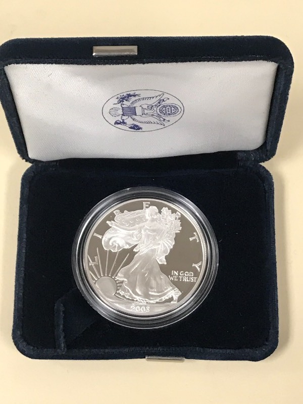 lot 45 image: 2003-W Silver American Eagle Dollar...