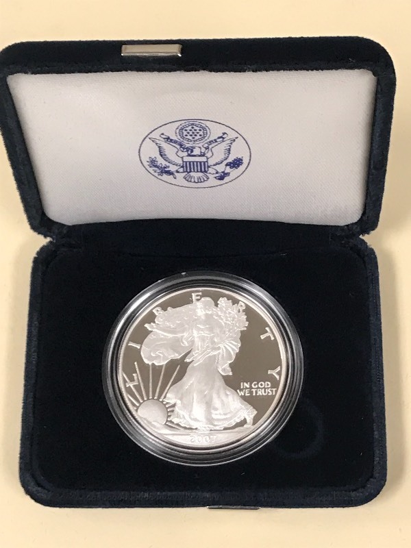 lot 50 image: 2007-W Silver American Eagle Dollar...