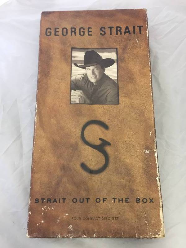 lot 8 image: George Strait Set - 4 CDs & Book