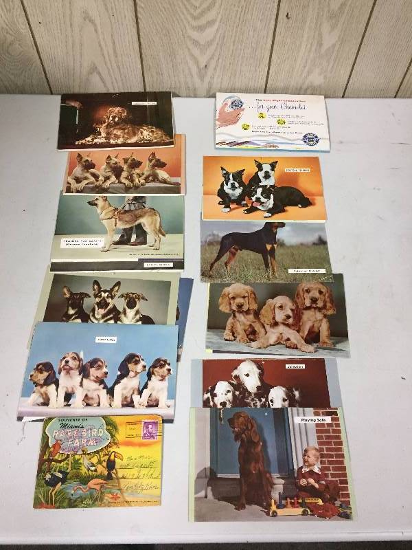 lot 57 image: Chevrolet Super Service Calendars with Dog tops & postcards