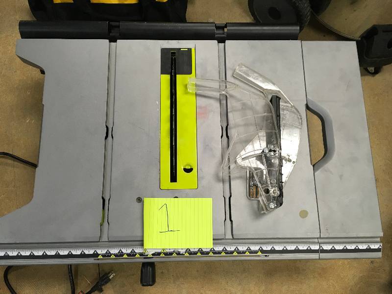 Ryobi 10 in. Portable Table Saw with Quick Stand  used in working conditions