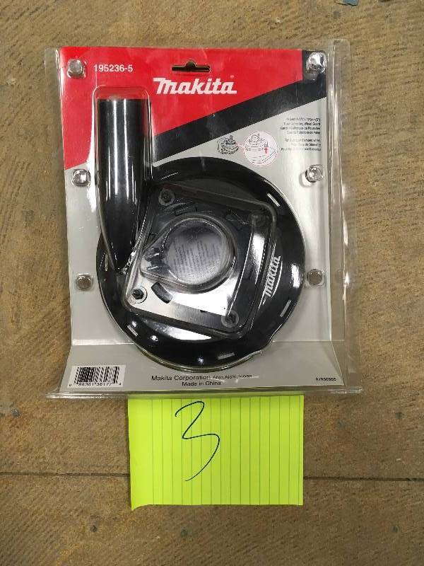 Makita 4-12 in. - 5 in. Dust Shroud used in working condition