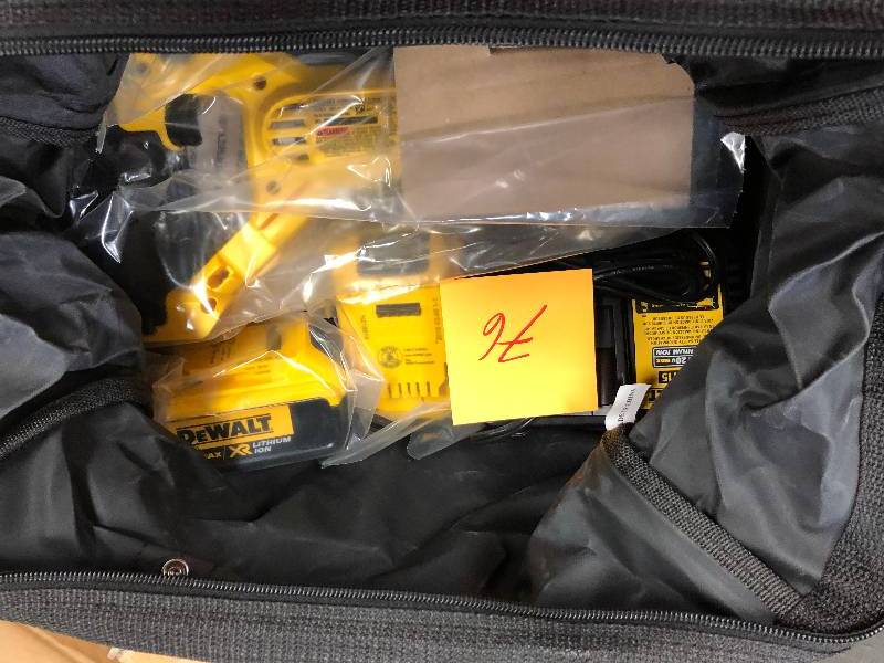 DEWALT 20-Volt MAX Lithium-Ion Cordless 18-Gauge Swivel Head Shear with (2) Batteries 4Ah, Charger and Contractor Bag Model#  DCS491M2 open box never used