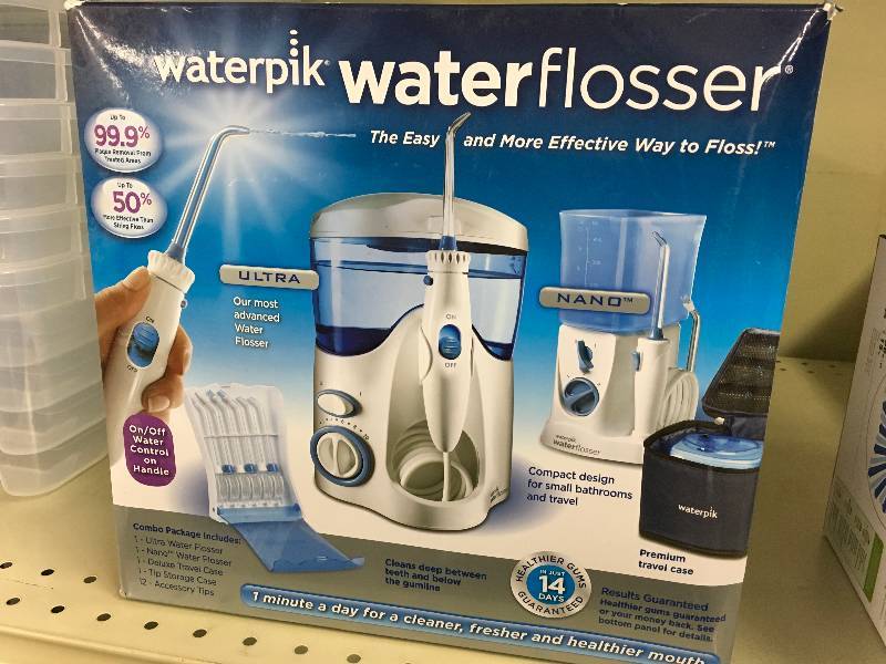 lot 26 image: WATERPIK ULTRATRAVELER, MSRP $79.99