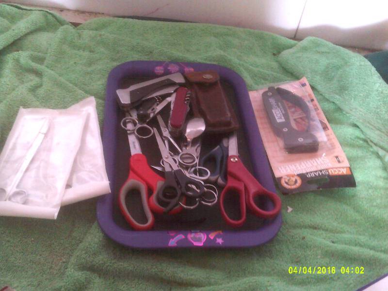 SCISSORS KNIVES AND SHARPENERS