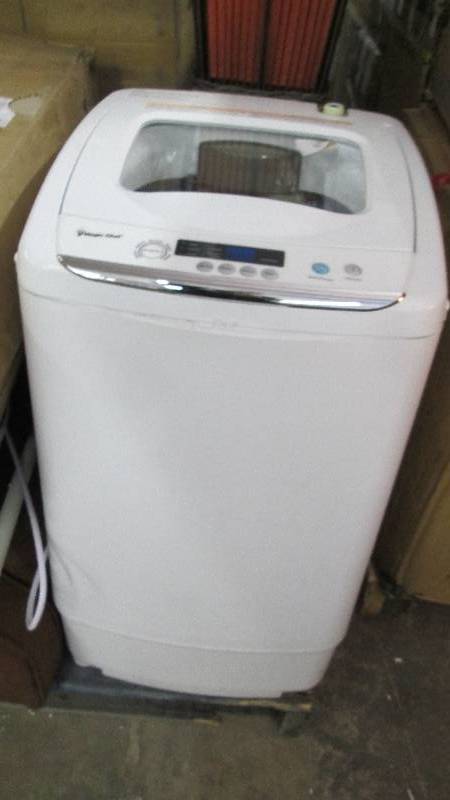 lot 88 image: Compact Top-Load Washing Machine by...