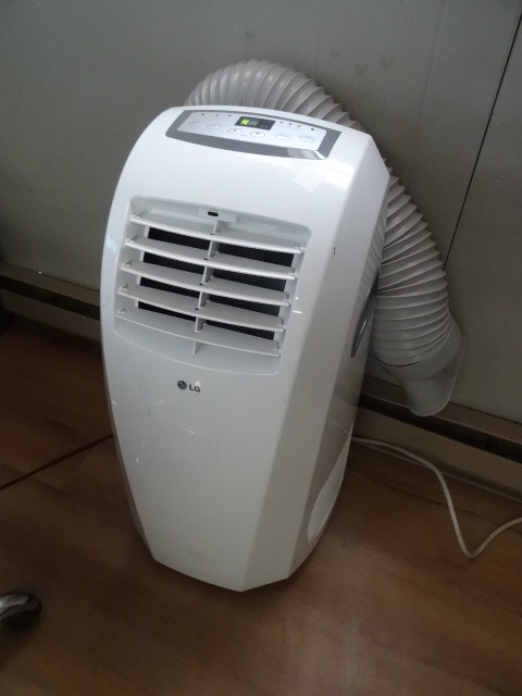 lot 99 image: LG portable air conditioner. Model ...