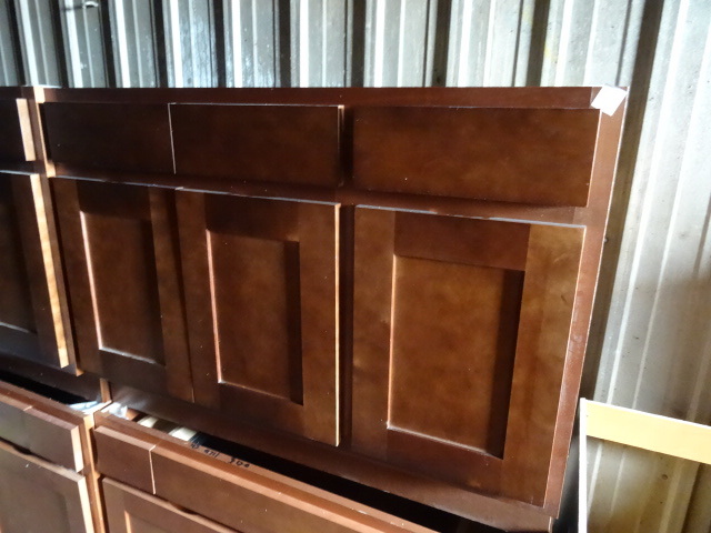 lot 128 image: Brand new 3 door base cabinet with ...
