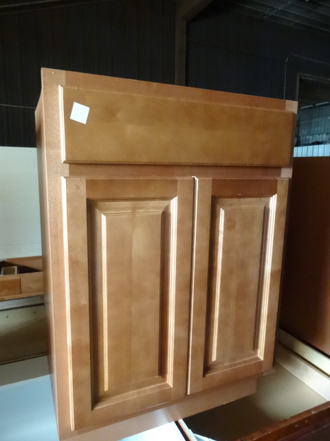 lot 129 image: Brand new base cabinet. 2 door. 24 ...