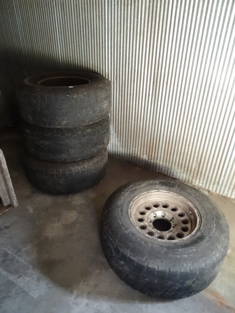 lot 133 image: 1 set of aluminum rims and tires. F...