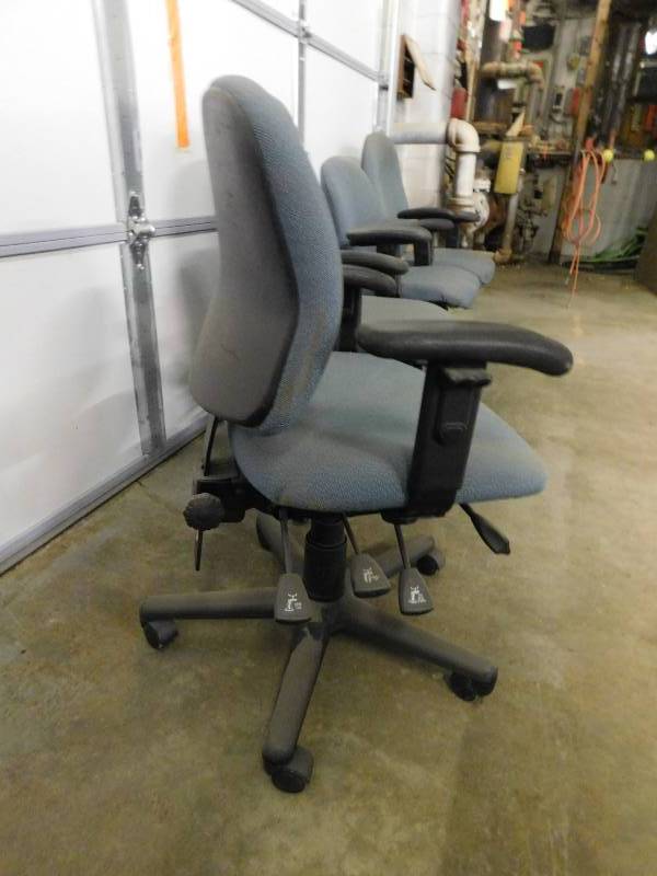 Four Adjustable Office Chairs