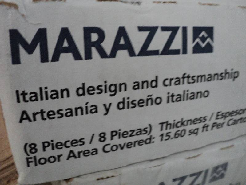lot 31 image: 10 cases of Marazzi Italian design ...