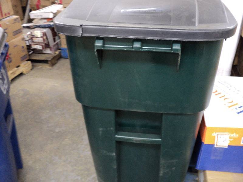 lot 71 image: 2 trash cans, blue one needs wheel,...