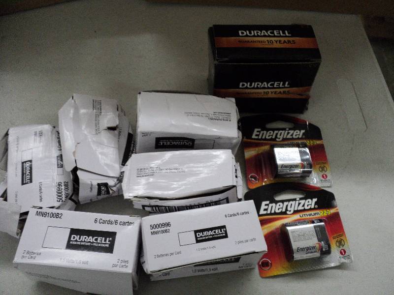 lot 140 image: Duracell and Energizer batteries, s...